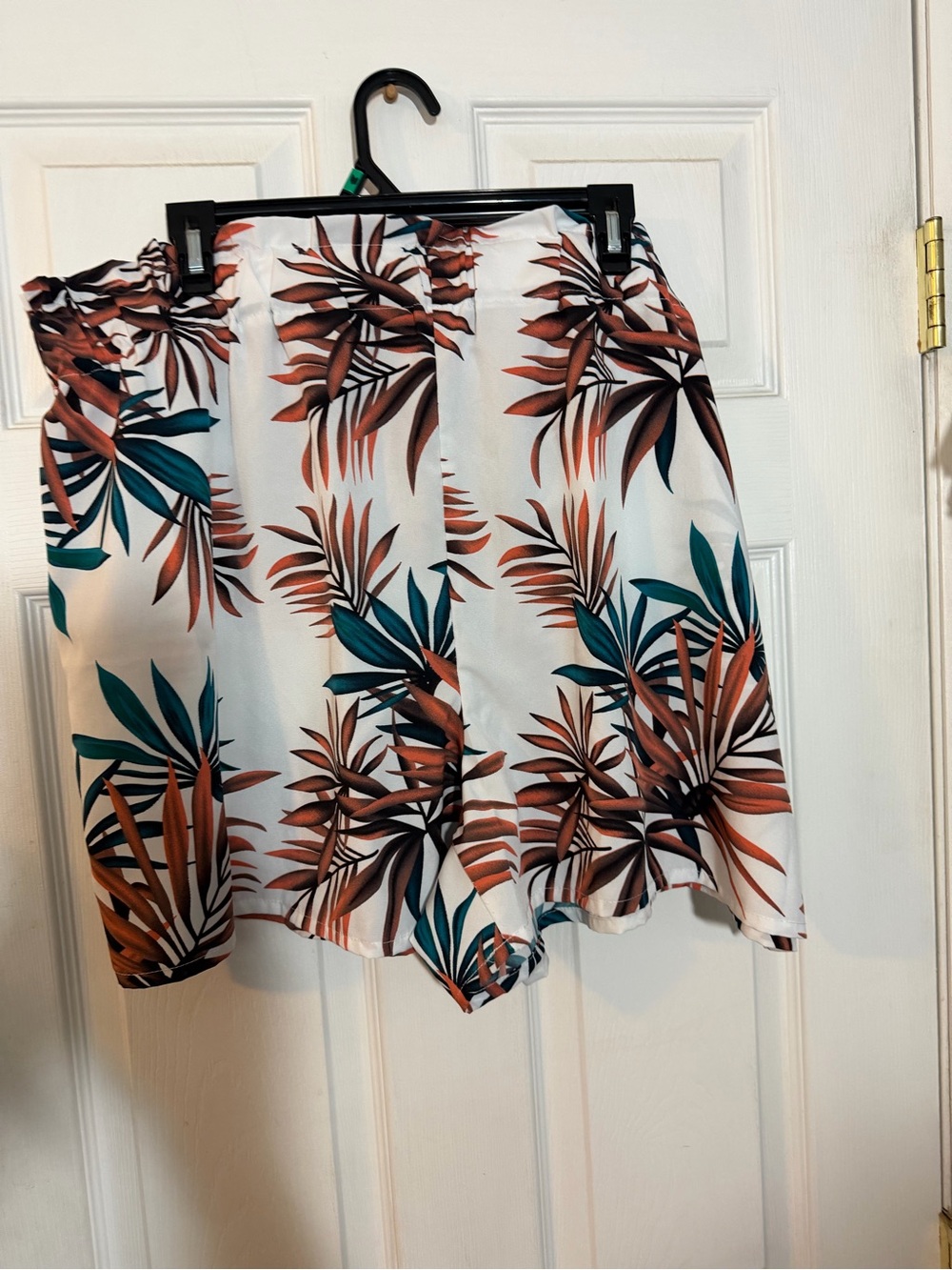 SHEIN White Shorts with Teal and Rust Leaf Print